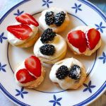 Pâte Sucrée is topped with cream and fresh fruits