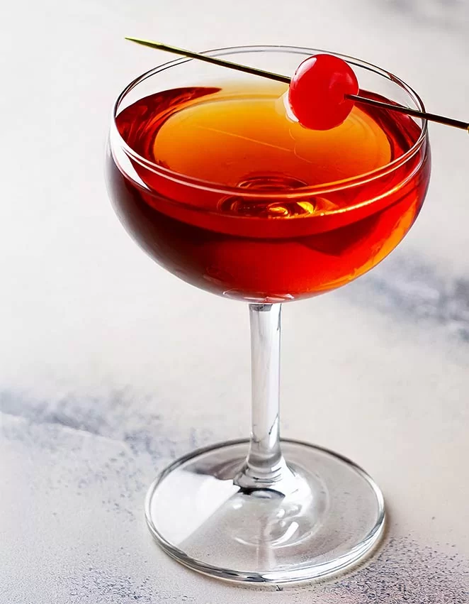 Easy Manhattan cocktail with maraschino cherry