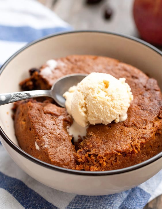 American Indian Pudding with a scoop of vanilla ice cream