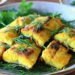 Turmeric Fish with Dill on a bowl