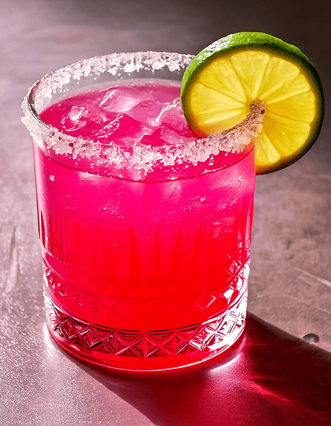 Best Prickly Pear Margarita recipe is garnished with lime wedge