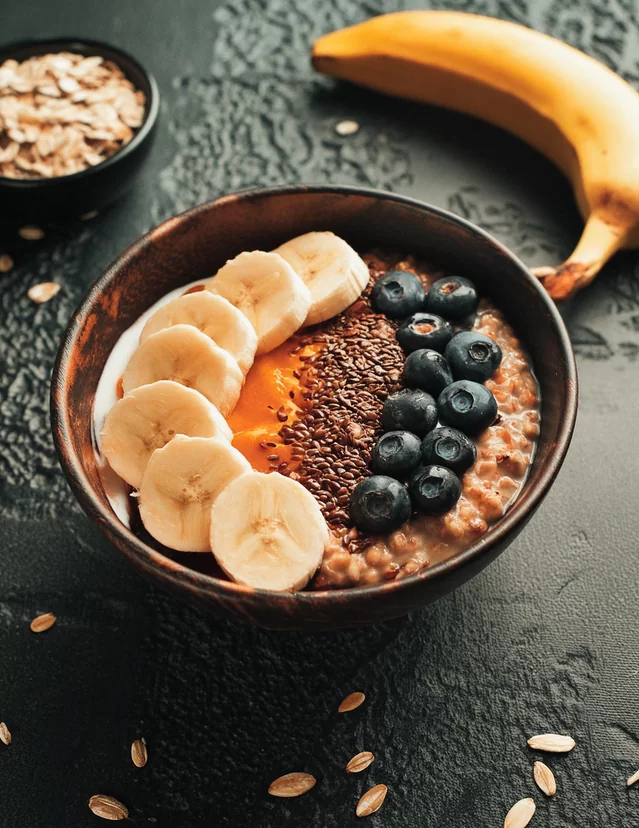 Vegan oatmeal with banana for breakfast