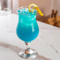 Simple Blue Hurricane Cocktail with blue curacao and tropical juice