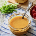 A bowl of honey dijon mustard dressing