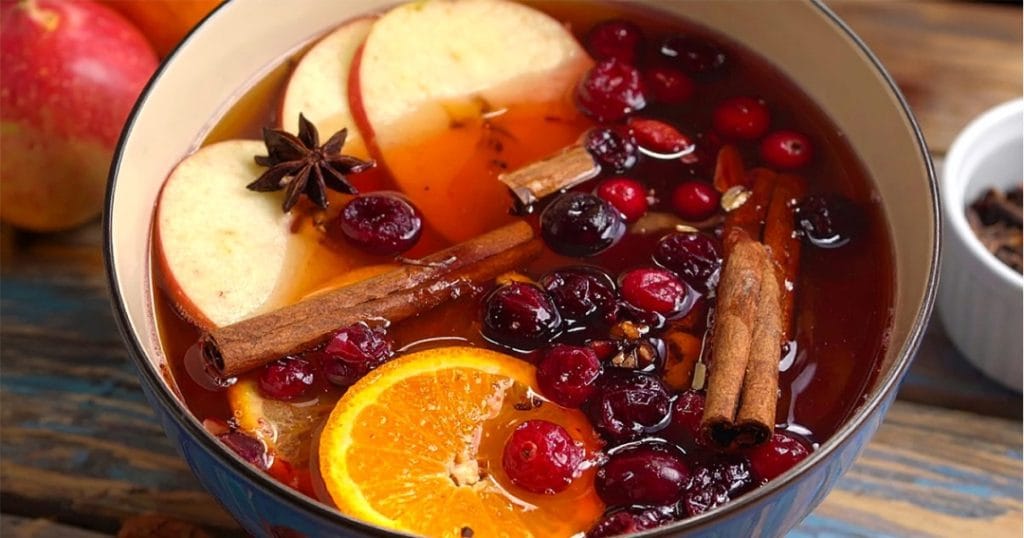 Thanksgiving cocktail with fruit juice, rum, and cinnamon
