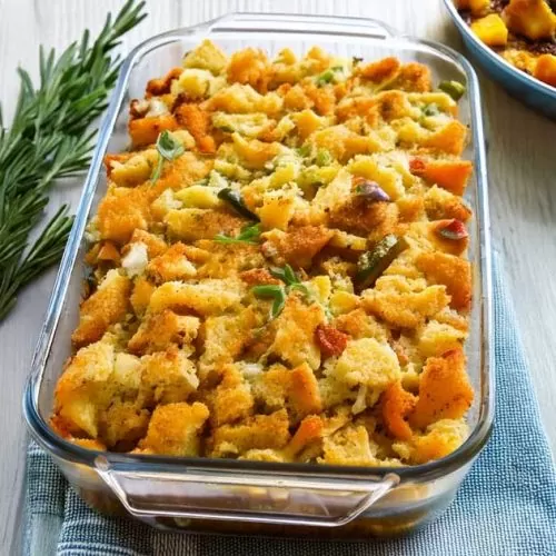 Baked Thanksgiving stuffing with breadcrumbs is on the table