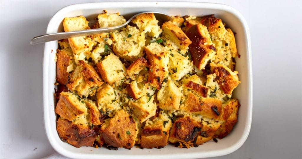 Baked Thanksgiving stuffing with breadcrumbs and herbs