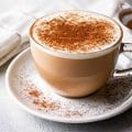A cup of hot cappuccino mixed with French vanilla
