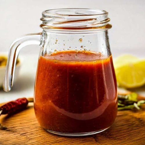 A mason jar of smoky harrisa dressing