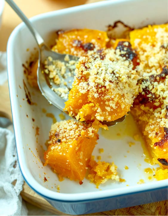 Baked Butternut Squash Casserole with breadcrumbs on top