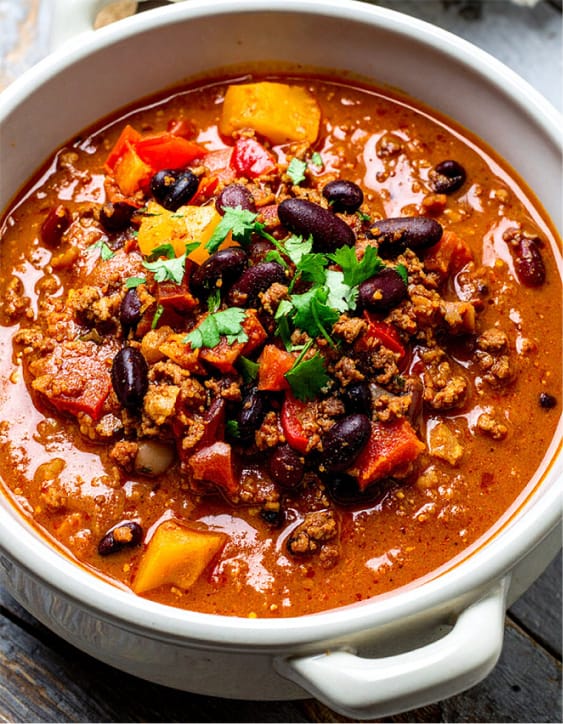 Simple pumpkin stew with ground meat, vegetables, and beans