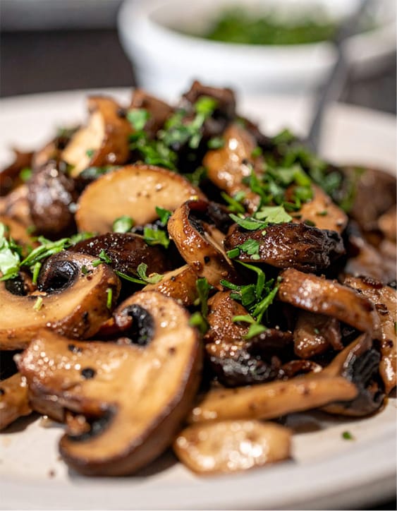 Sauteed Mushrooms, garnished with chopped fresh parsley